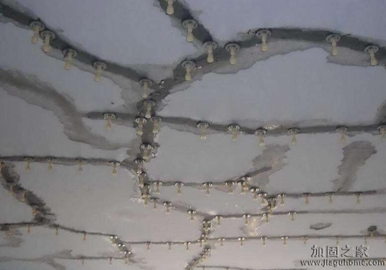 淺析建筑物裂縫加固及修補