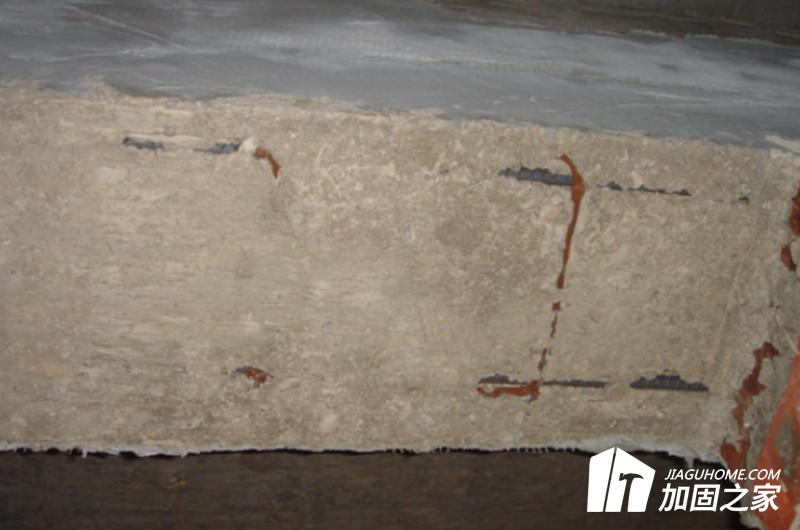 梁、柱端受拉鋼筋受壓區(qū)混凝土后被壓碎